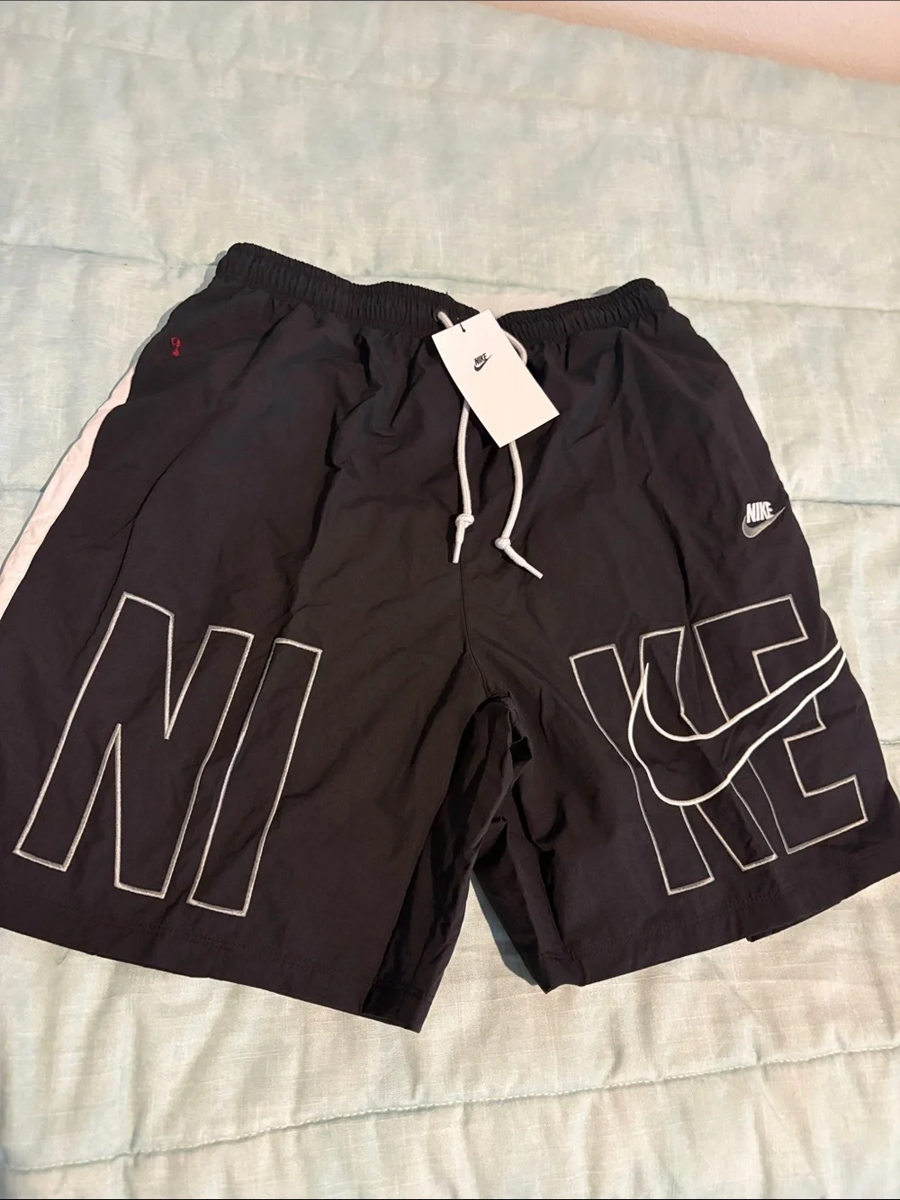 Nike Black Shorts with White Outline NIKE Graphic tapered fit mid thigh medium